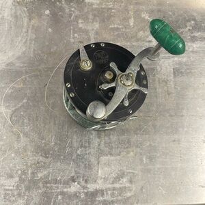 Penn 149 Vintage Fishing Reel with Green Handle